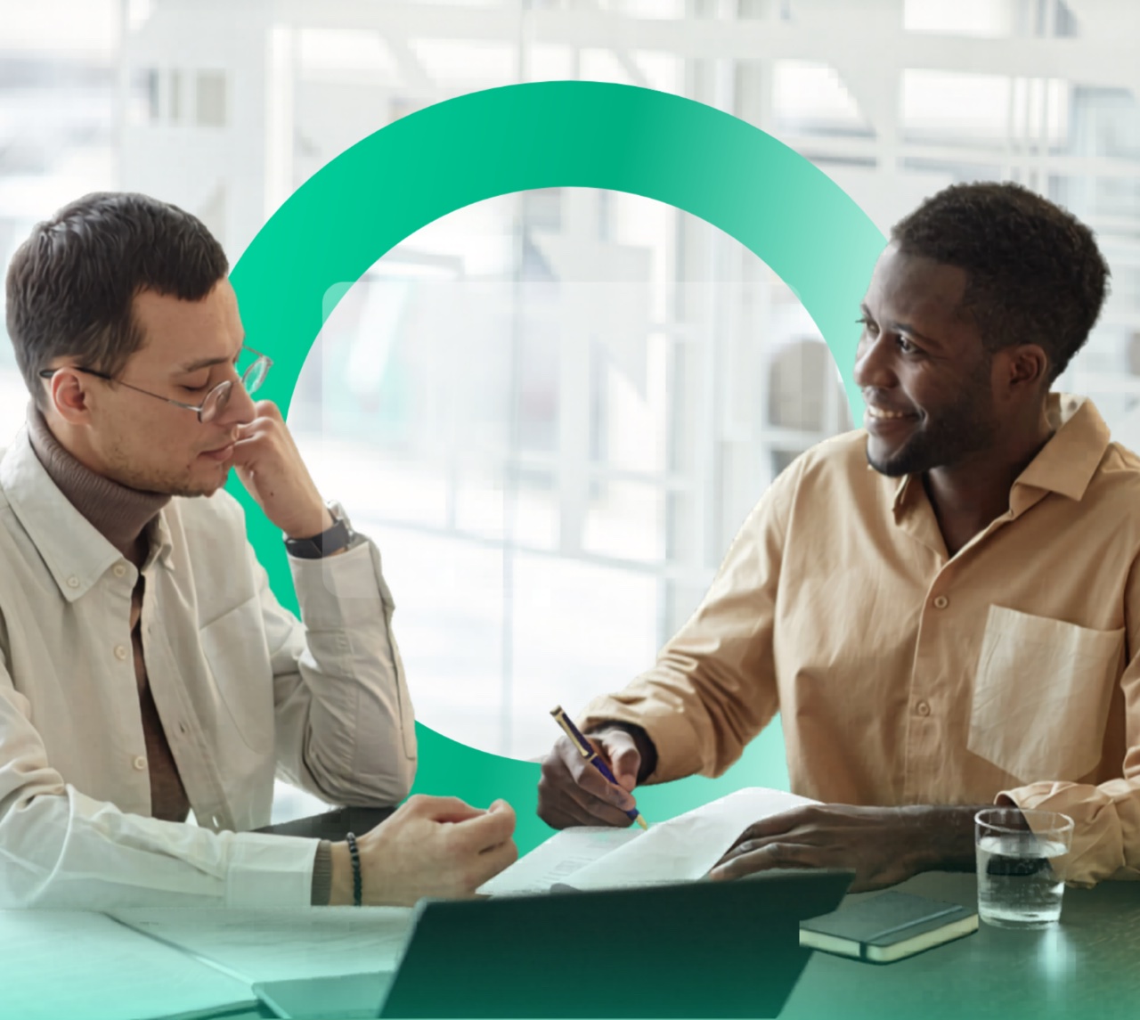 Clover strategist and client reviewing a marketing plan together in a meeting room.